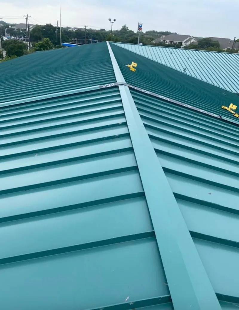 Green commercial metal roof ridge and valley for Metal Roof Repair in Ligonier